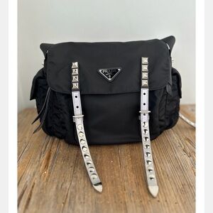 Prada Black crossbody messenger bag with Silver Studded Straps.